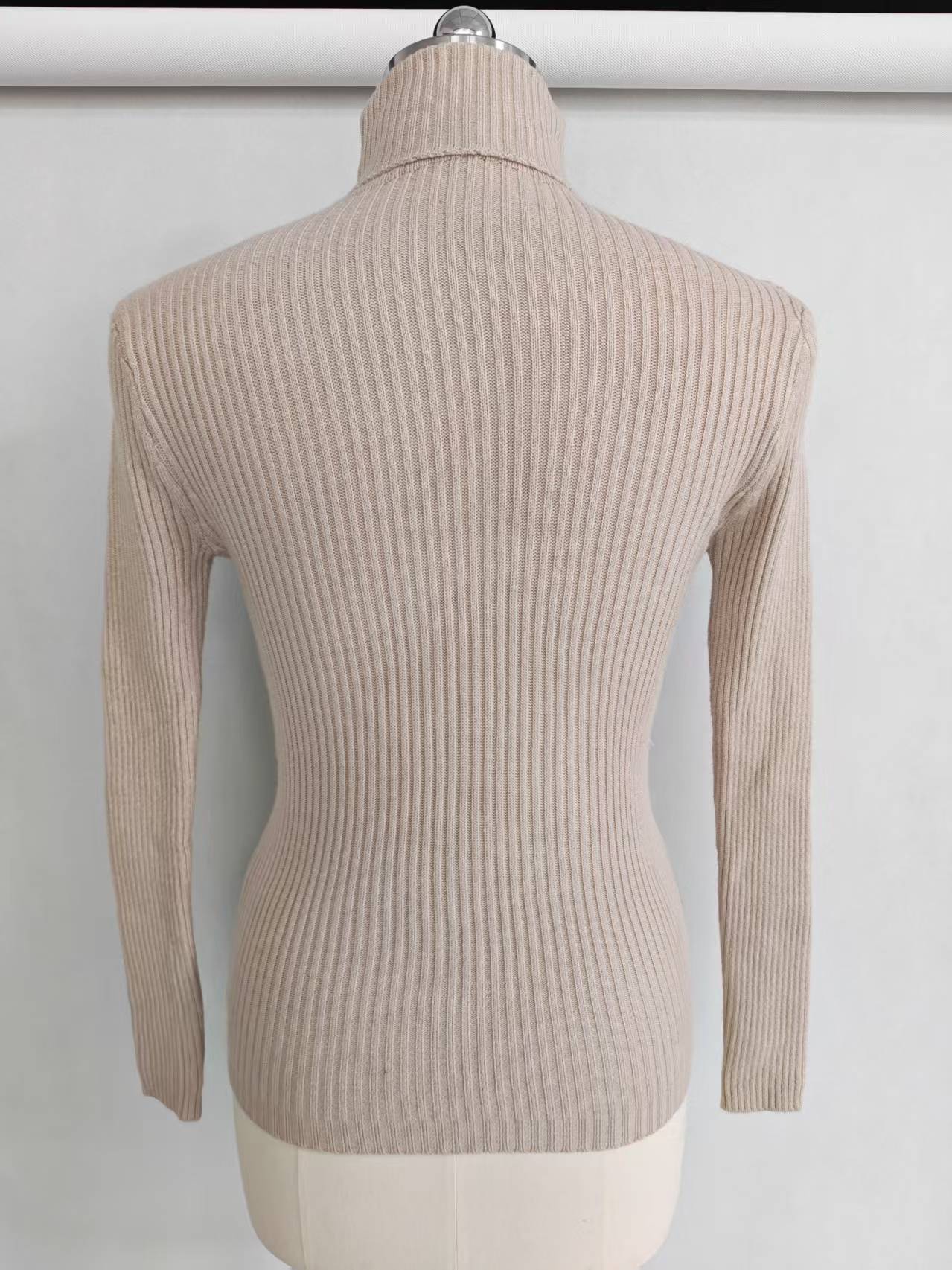 Back view of women's fitted knit pullover sweater TF9552