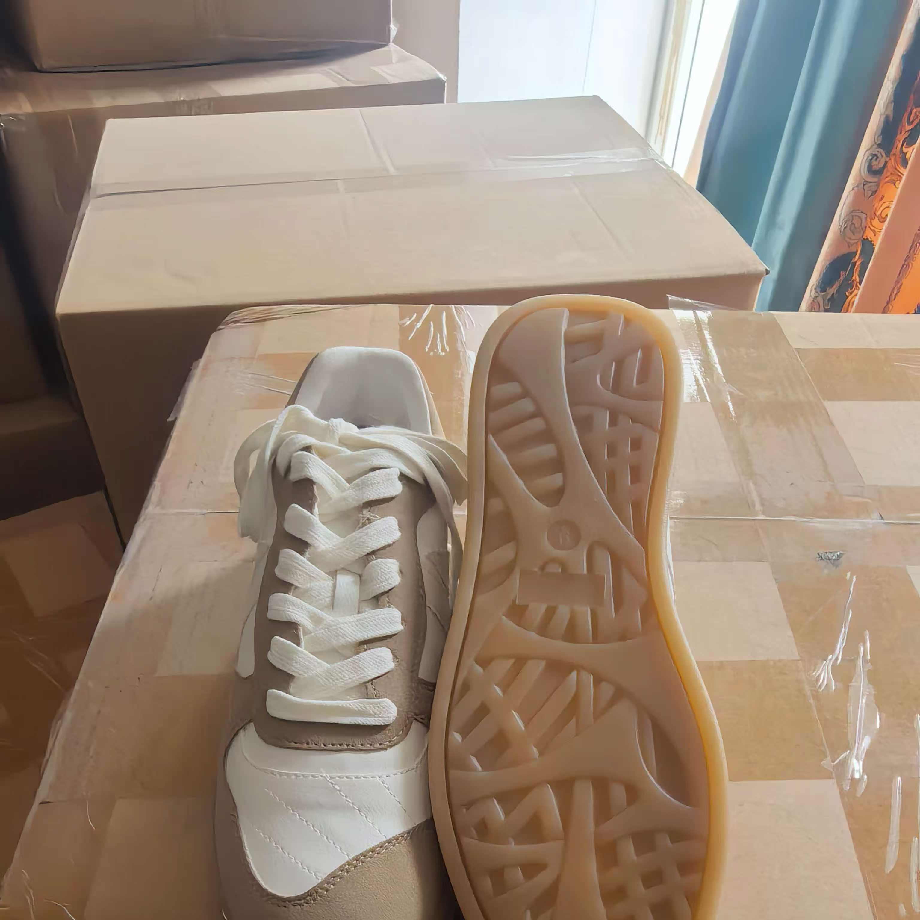 Side view of women's black and white retro sneakers