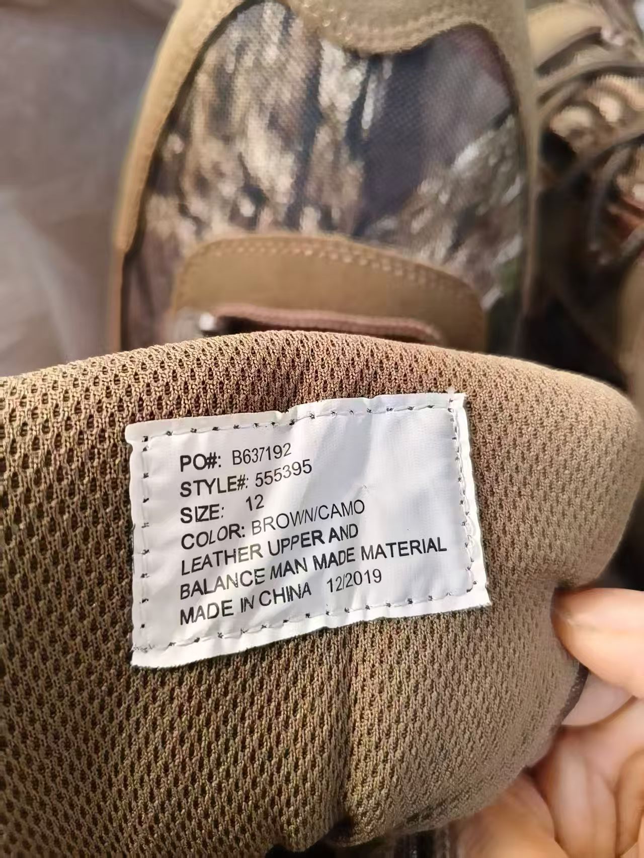 Detail view of men's camo work boots TF9226 with tags