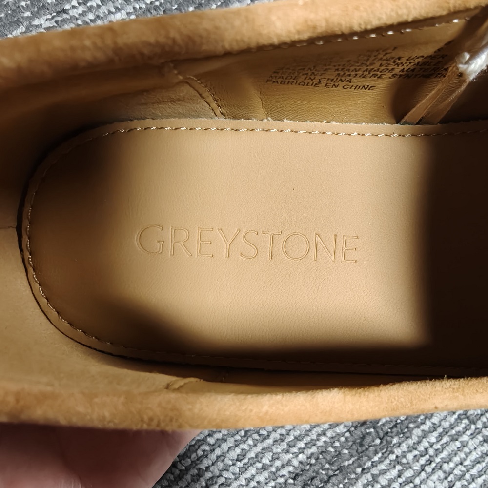 Close-up detail of inner lining on women's chestnut shoes