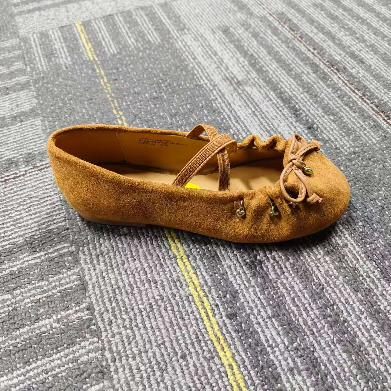 Side view of girl's tan casual flat shoes TF9515