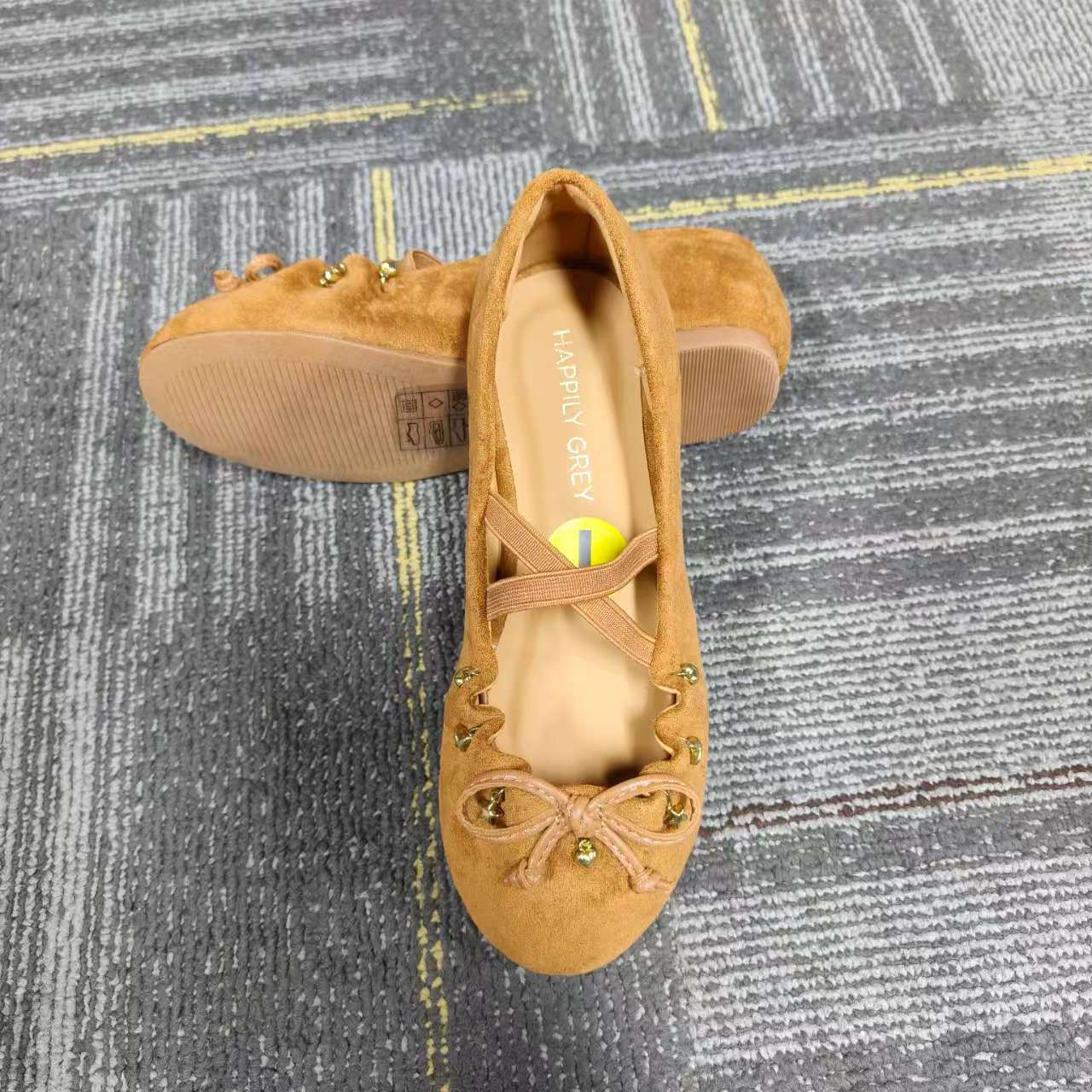 Front view of girl's tan soft moccasin shoes wholesale