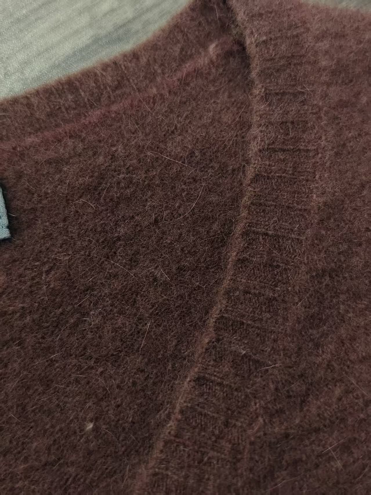Soft cotton blend knit fabric texture on women's cardigan