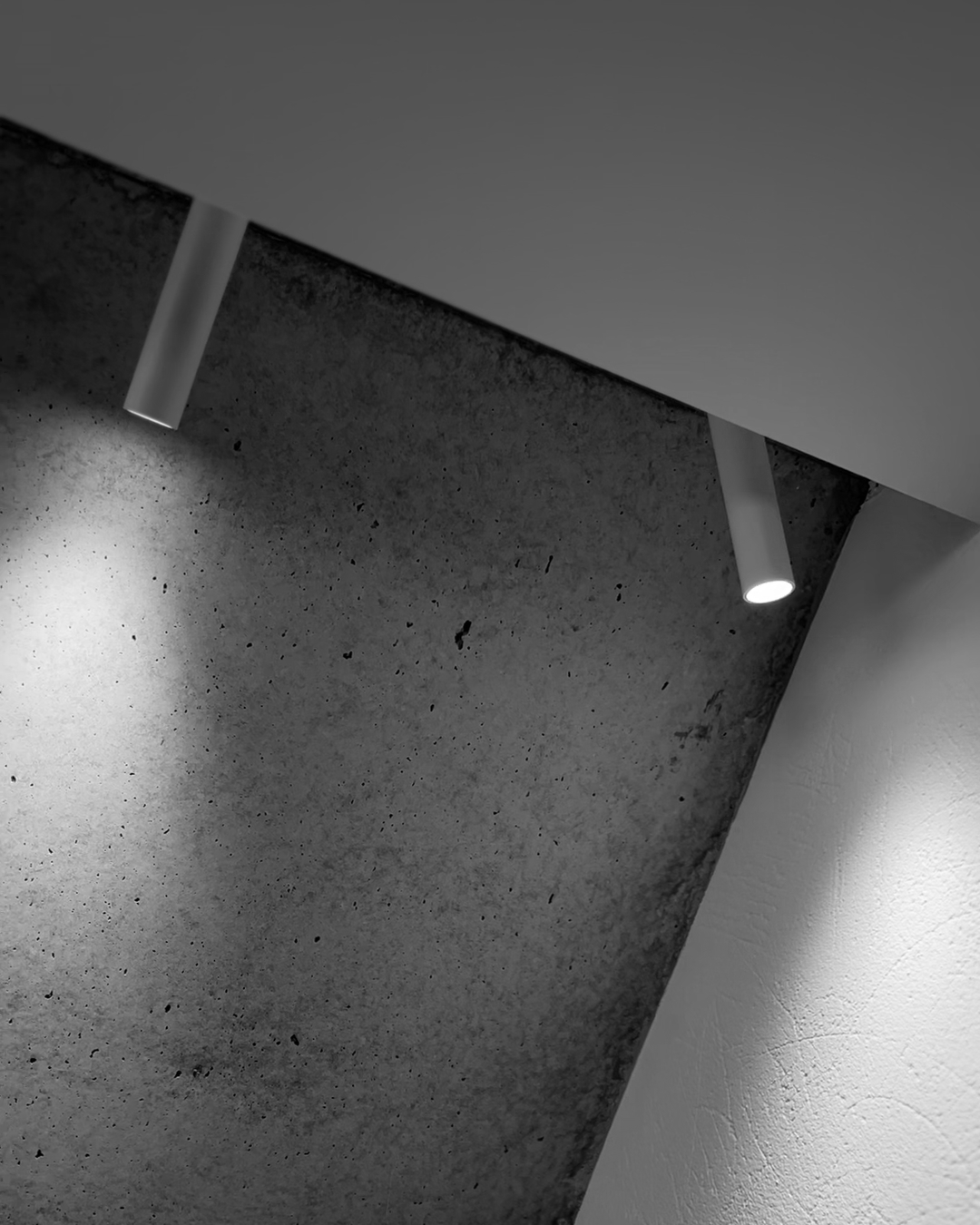 Architectural spotlight fixture installed on a wall