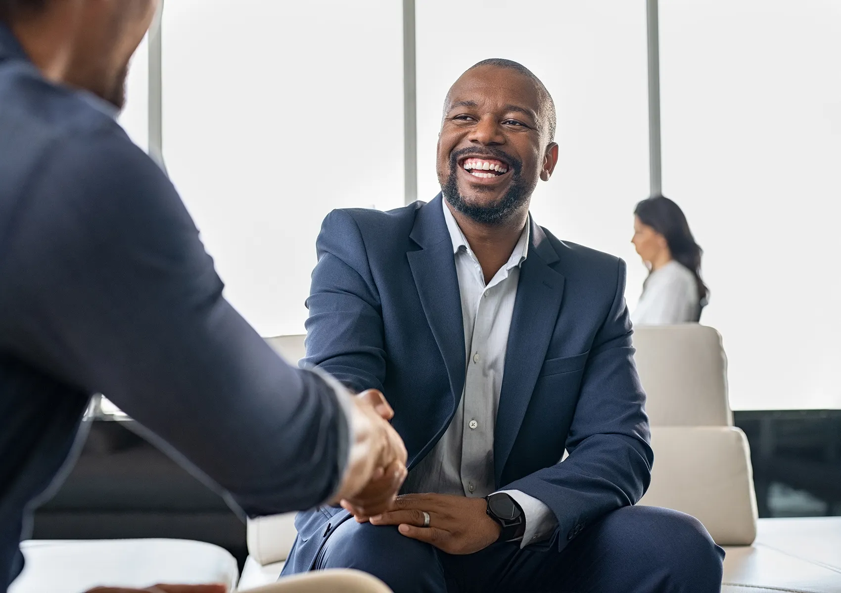 Relationship manager meeting with a client in a professional setting
