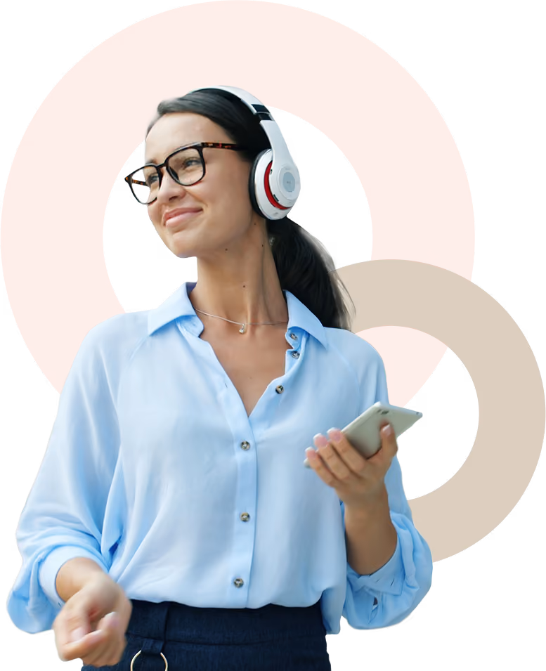 Young woman wearing glasses and headphones holding a smartphone, smiling and looking to her left.