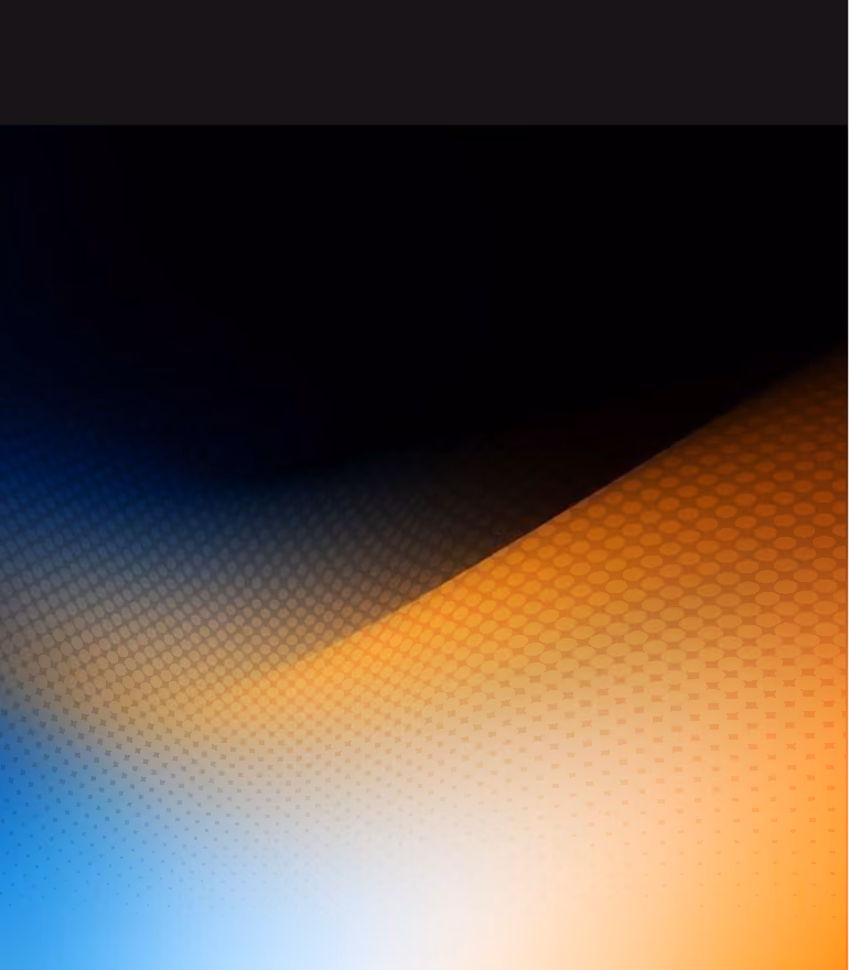 Abstract background with gradient blue and orange hues blending with hexagonal pattern.