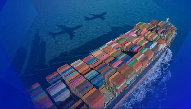 Cargo ship loaded with colorful shipping containers sailing with airplane shadows overhead on blue water.