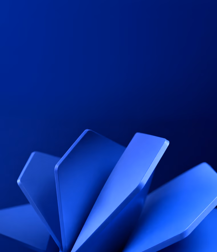 Close-up of blue geometric shapes resembling overlapping fan blades against a dark blue background.