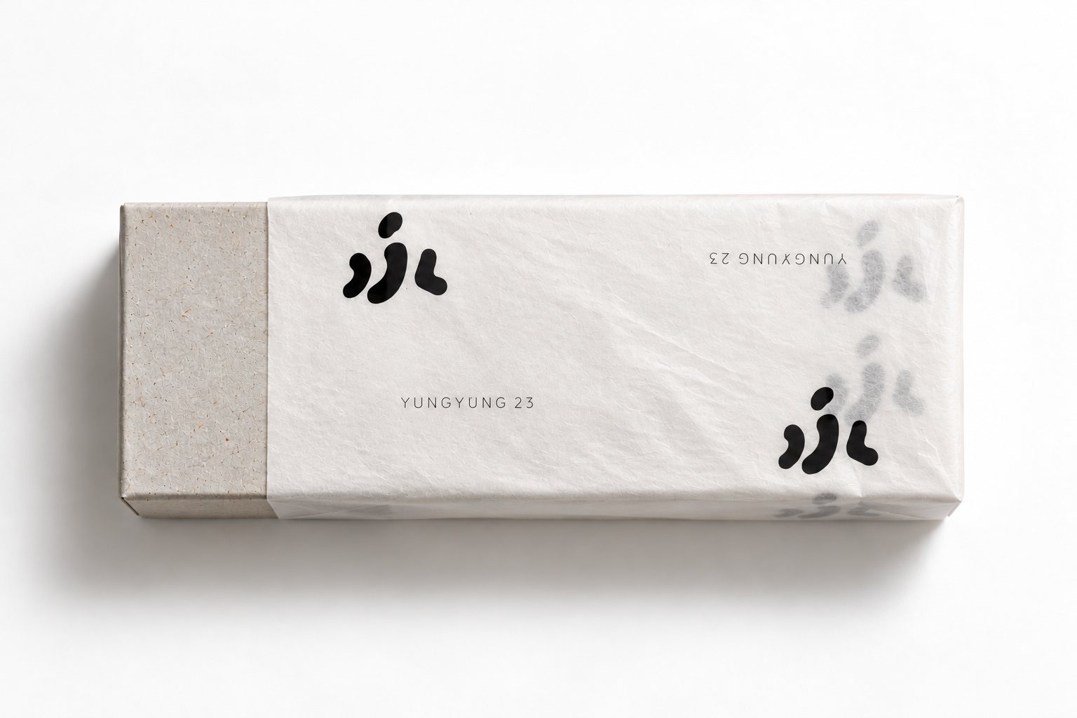 Long tea box wrapped in Yung Yung printed tissue paper