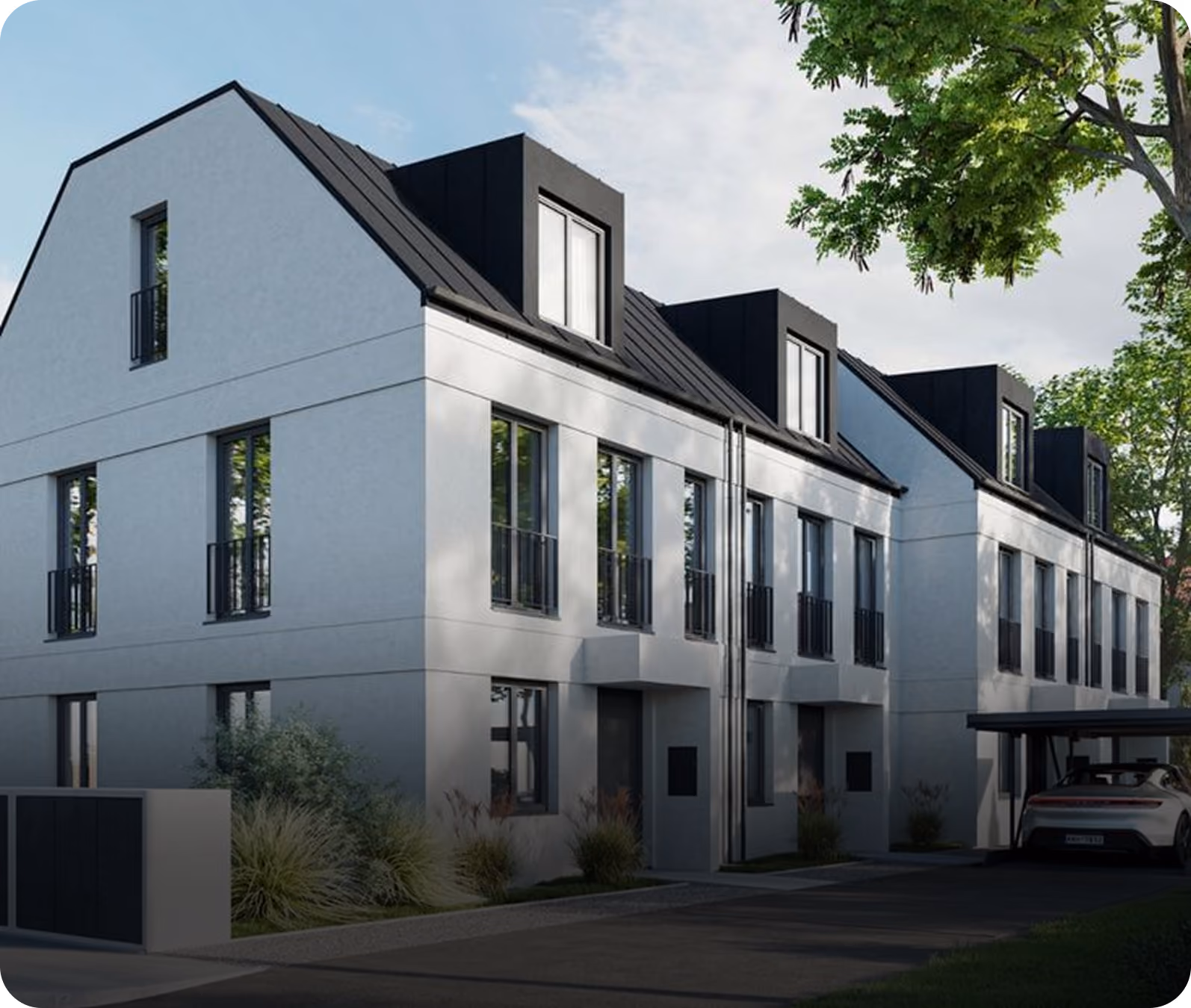 Moderner Mehrfamilienhaus-Neubau mit Gauben und Carport