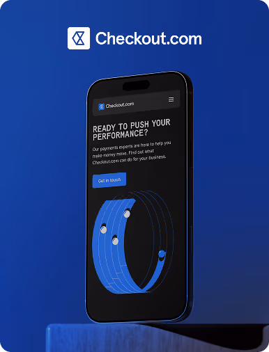Flow Ninja Foresight audit showcase — Checkout.com website displayed on a mobile phone, featuring the "Ready to push your performance?" hero section.