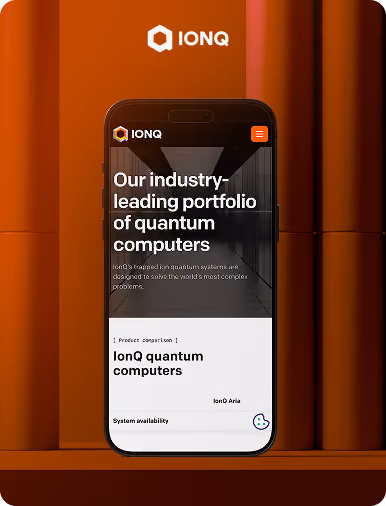 Flow Ninja Foresight audit showcase — IonQ website displayed on a mobile phone, featuring the "Our industry-leading portfolio of quantum computers" homepage.