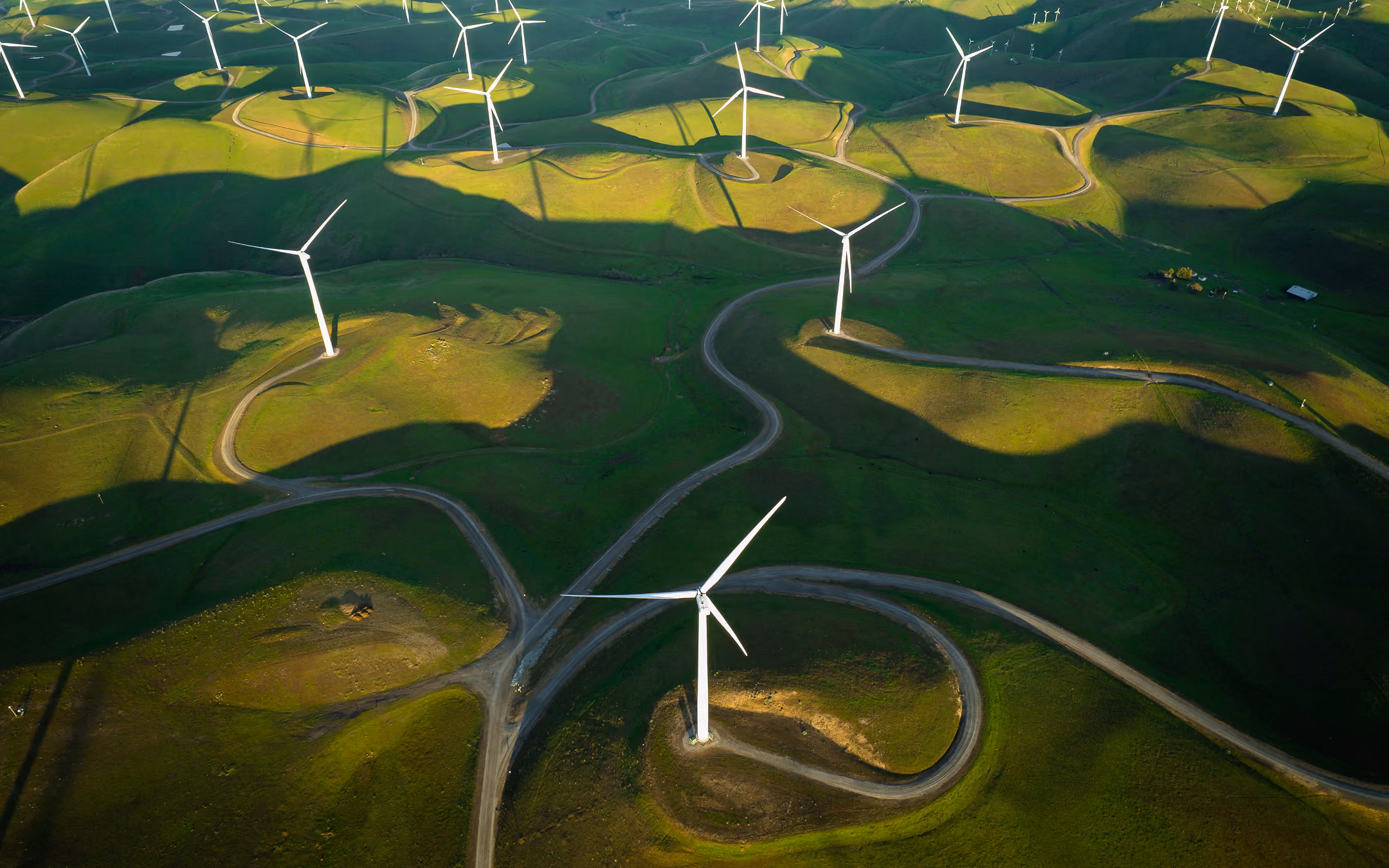 windmills on a grass landscape