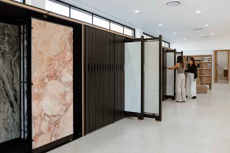 A wall of benchtops and tiles
