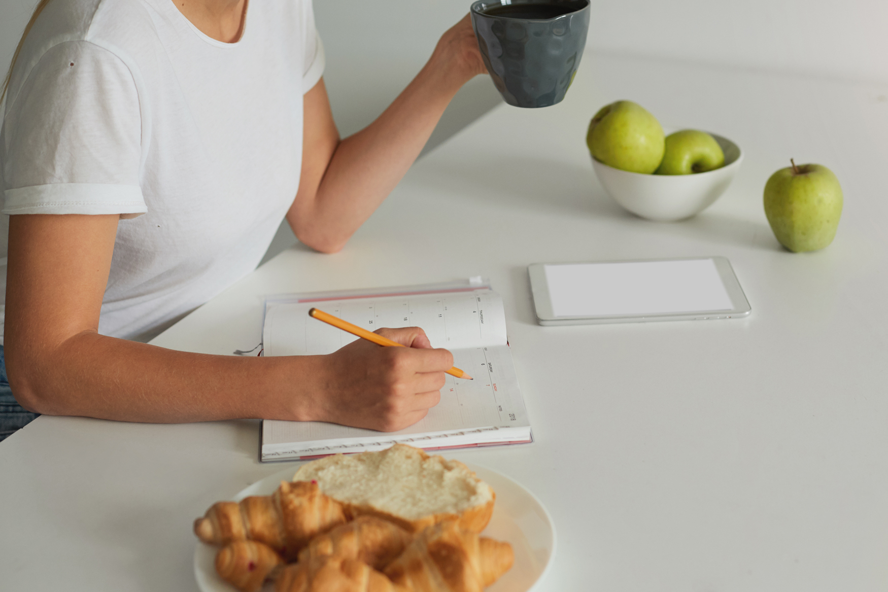 Woman planning her recovery after a tooth extraction