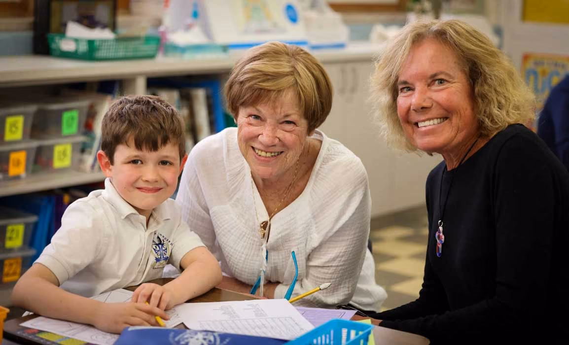Catholic school teachers with student
