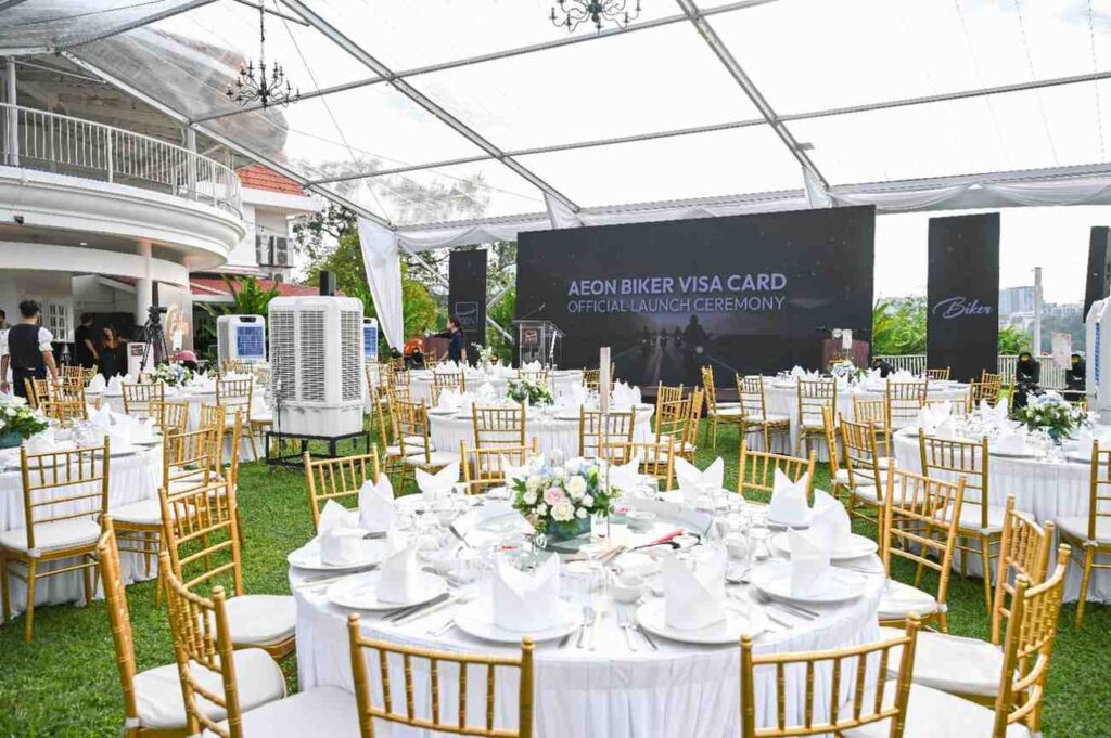 Round banquet tables under a marquee at the AEON Biker Visa Card launch ceremony, catered by iDoCatering