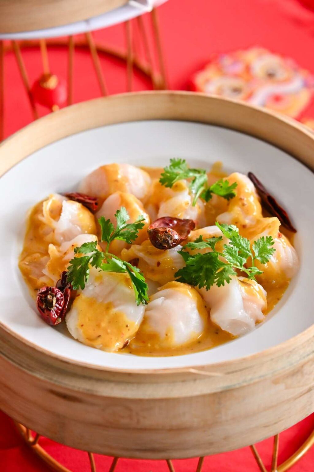 Prawns in golden sauce with dried chillies and coriander in a bamboo steamer, iDoCatering Chinese New Year catering