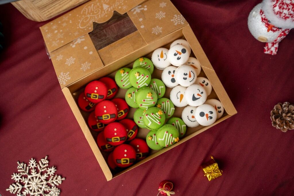 Christmas macaron gift box with Santa, tree and snowman designs by iDoCatering