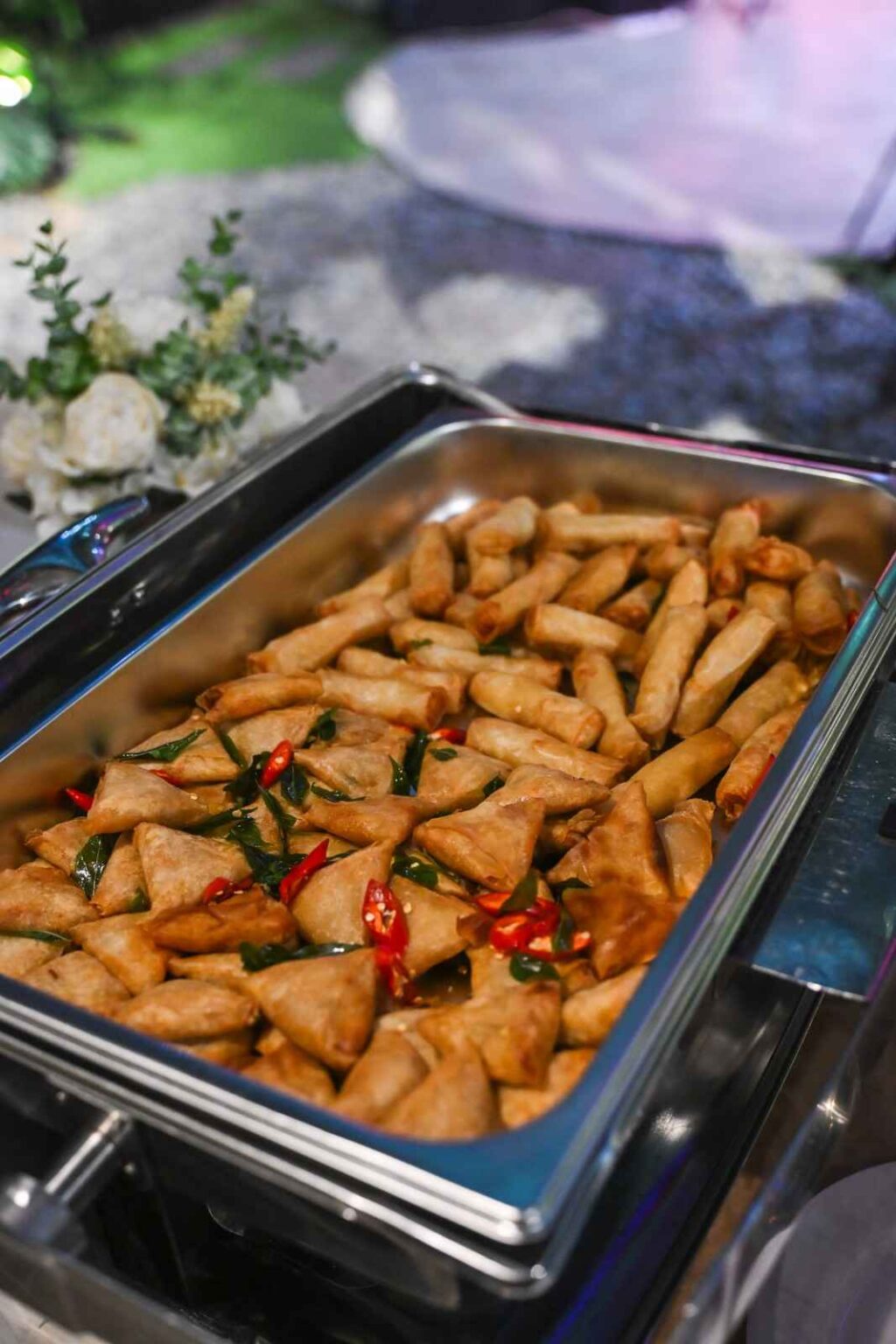 Chafing dish of fried samosas and spring rolls at an iDoCatering buffet, Glasshouse Seputeh Indian wedding
