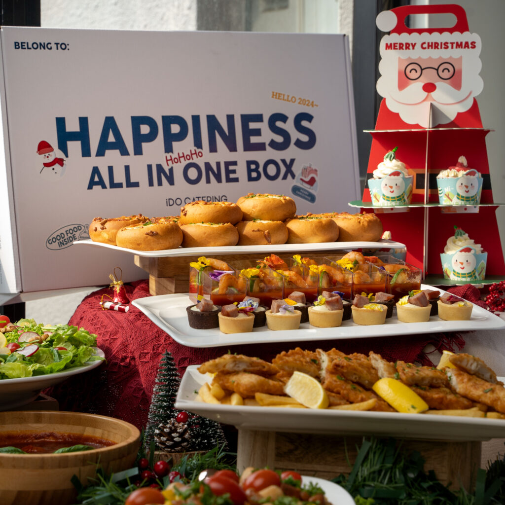 iDoCatering Christmas 2023 party box display with cheese buns, prawn cocktail cups, ham tartlets and fried fish