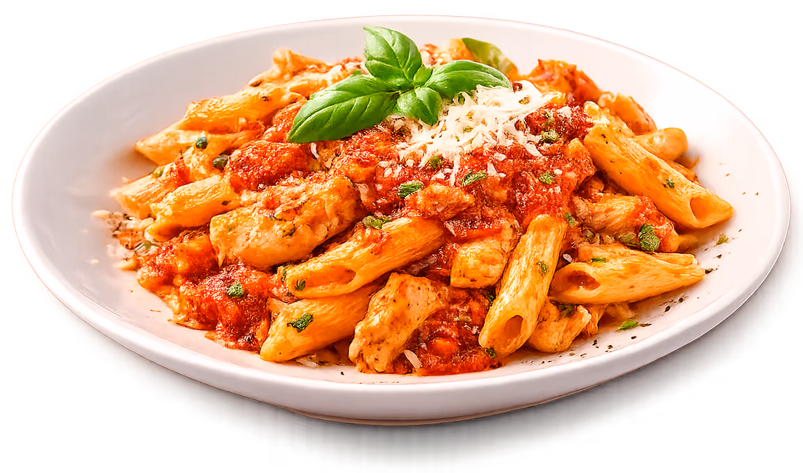 Plate of penne pasta with tomato sauce, grilled chicken pieces, grated cheese, and basil garnish.
