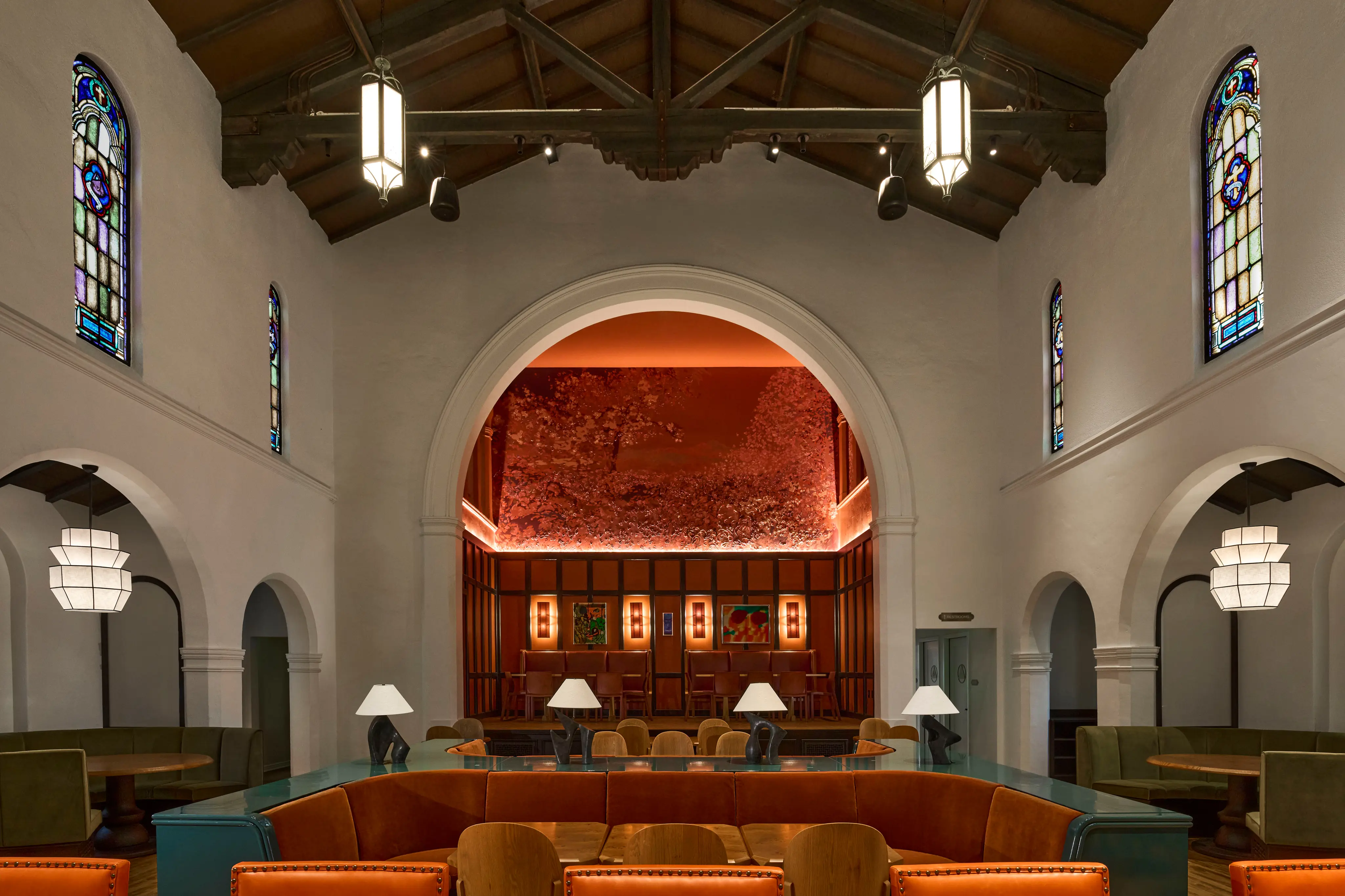 The main sanctuary dining room beneath the vaulted church ceiling