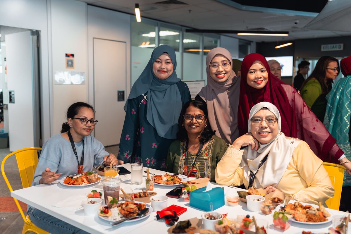 PricewaterhouseCoopers Malaysia colleagues enjoying Lily's farewell lunch catered by iDo Catering in KL