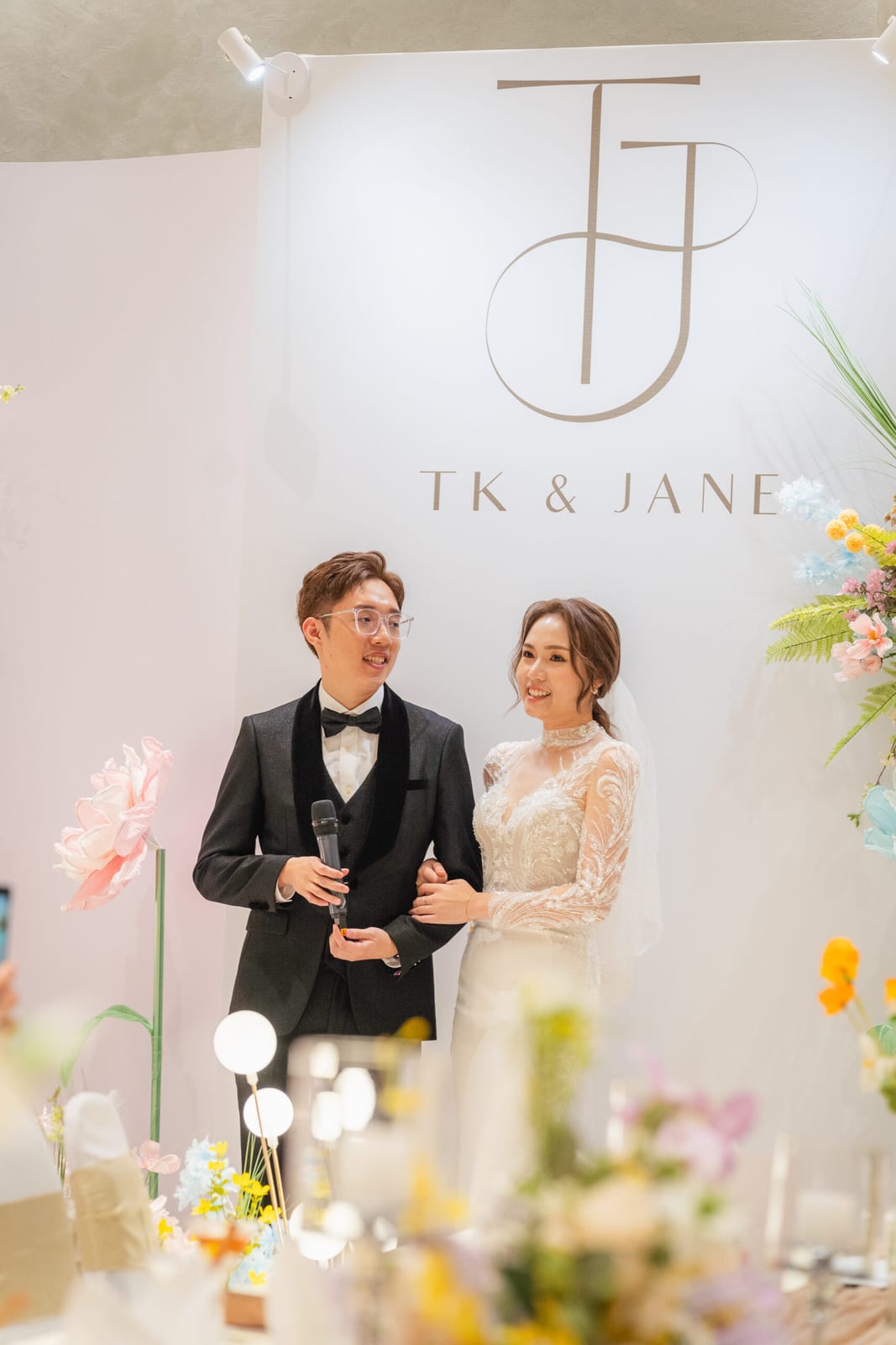 Bride and groom giving speeches at their wedding catering event in Malaysia — iDoCatering