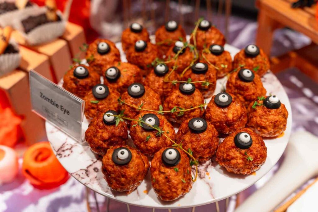Zombie Eye meatballs topped with olive eyeballs at the Paxtonz Halloween party at Empire City