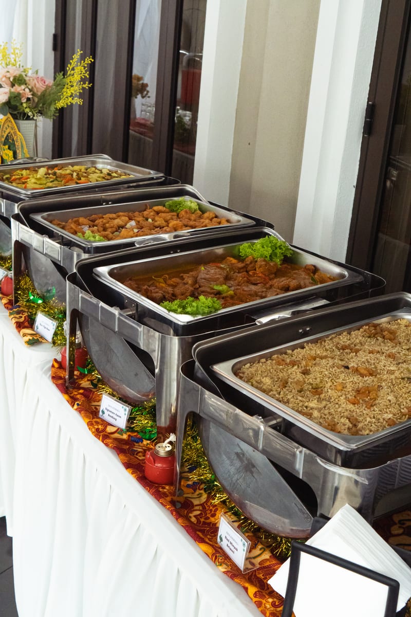 Buffet line of chafing dishes with nasi minyak, ayam rendang and mixed vegetables, iDoCatering Hari Raya catering