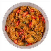 Classic chicken rendang with red chilli in a bowl — iDoCatering