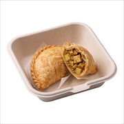 Potato curry puff cut open to show the filling — iDoCatering seminar buffet