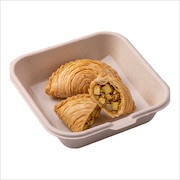 Premium chicken curry puff cut open to show the filling — iDoCatering seminar buffet