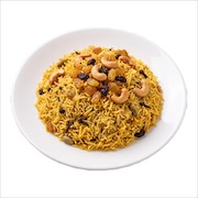 Nasi briyani topped with raisins and cashew nuts — iDoCatering buffet
