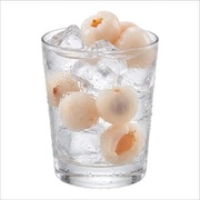Glass of iced lychee drink with whole lychees — iDoCatering buffet