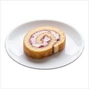 Slice of swiss roll on a plate — iDoCatering light refreshment