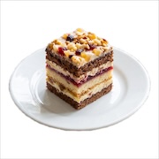 Slice of layered assorted cake on a plate — iDoCatering light refreshment