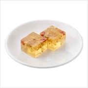 Osmanthus flower jelly cubes with goji berries on a white plate — iDoCatering buffet