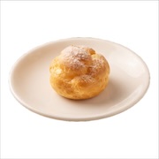 Cream puff dusted with icing sugar on a white plate — iDoCatering buffet