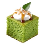 Pandan sponge cube topped with cream and a gula melaka drizzle — iDoCatering dessert canapé