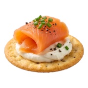 Smoked salmon with cream cheese and chives on a round cracker — iDoCatering canapé