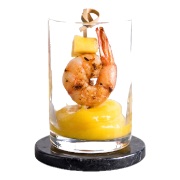 Grilled shrimp skewer on mango purée in a shot glass — iDoCatering canapé shooter