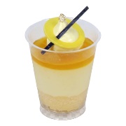 Passion fruit and mango layered dessert cup with a lemon slice — iDoCatering