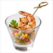 Grilled prawn skewer over diced peppers in a glass cup — iDoCatering canapé