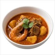 Mutton curry with potato and a whole prawn in a rich orange gravy, topped with coriander — iDoCatering buffet