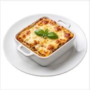 Chicken lasagna baked in a white square dish with melted cheese and fresh basil — iDoCatering buffet