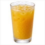 Chilled orange fruit juice poured over ice in a tall glass — iDoCatering buffet