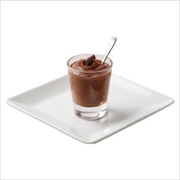 Chocolate mousse in a shot glass dusted with cocoa and topped with a chocolate curl — iDoCatering buffet